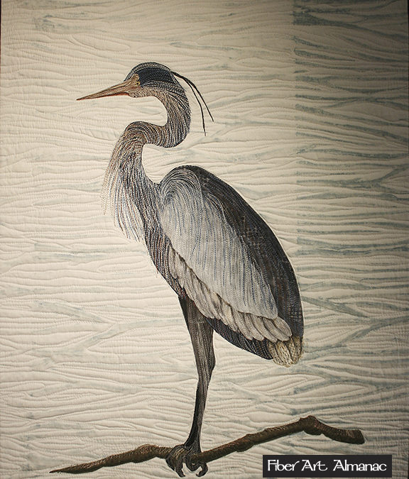 Thread painted art quilt…stitching a blue heron