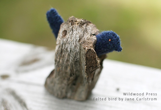 Woolen Fabric Felt sewn from fulled wool fabric, perched in found tree branch hole.